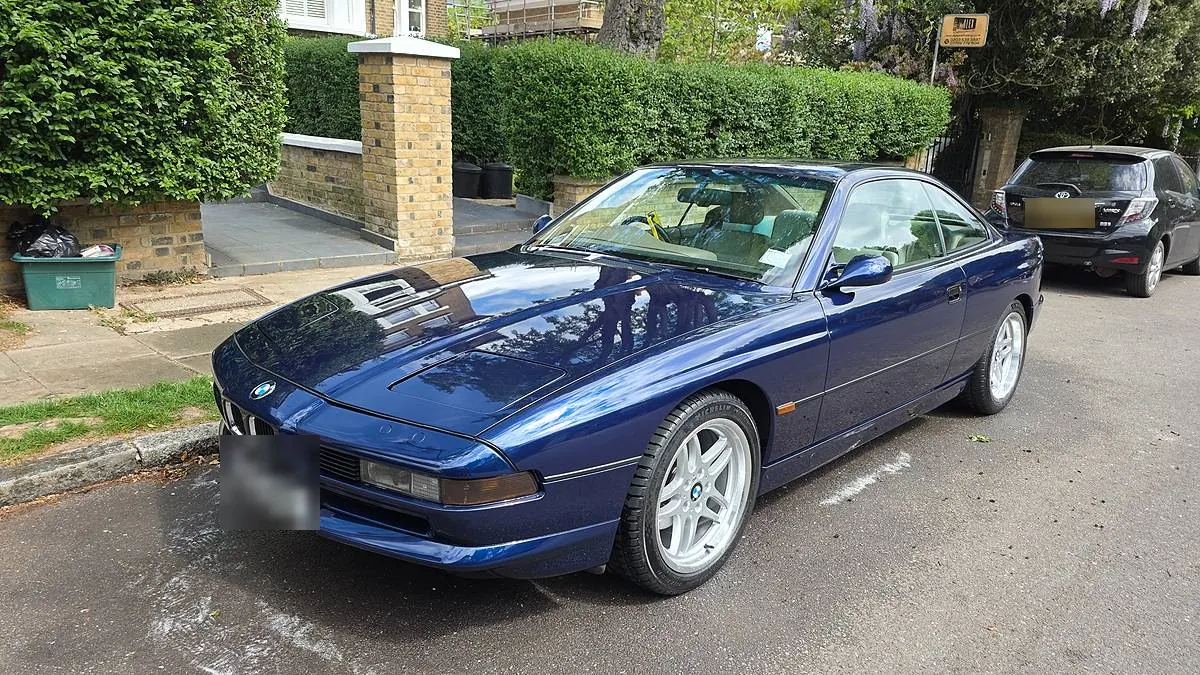 A blue BMW 8 Series coupe with a deep waxed shine after an Exterior Wash and Wax