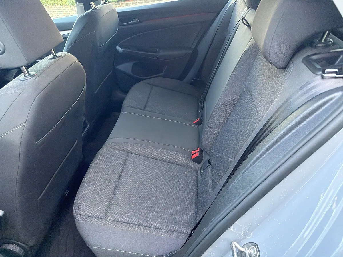 Rear bench of a VW Golf vacuumed and shampooed, fabric clean and even