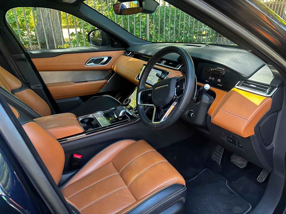 Range Rover Velar front cabin with tan leather cleaned and conditioned